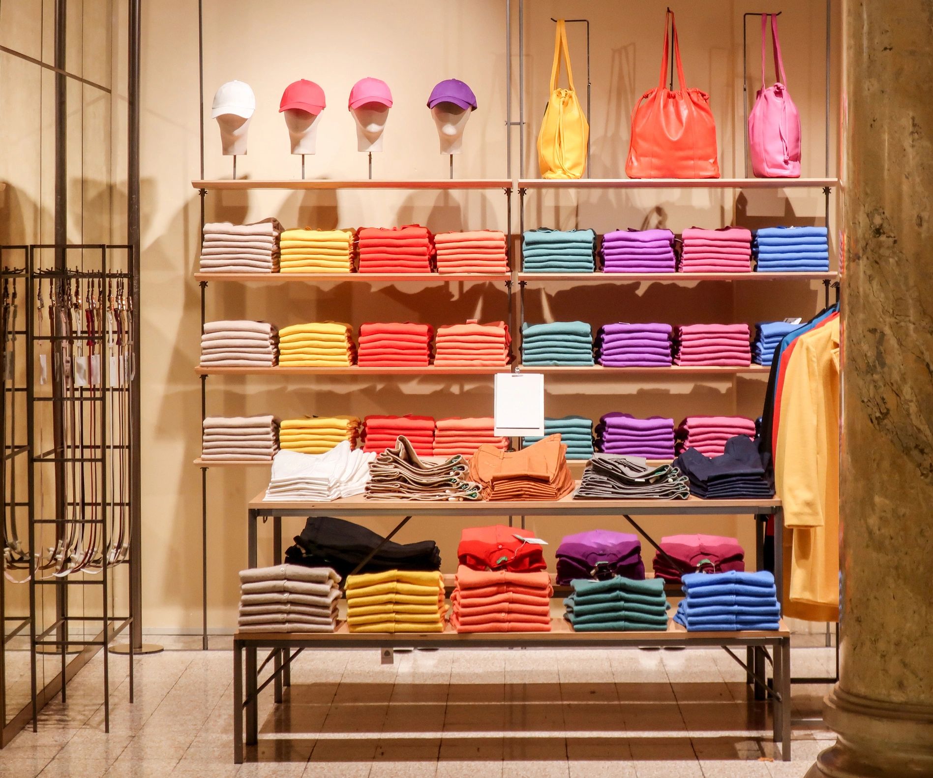 Modern apparel retail display with folded clothing